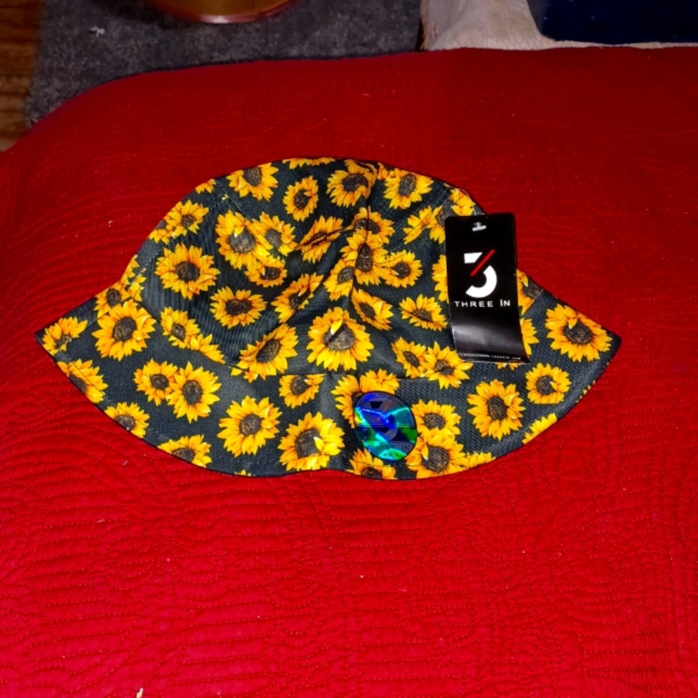 Sunflower hat. THREE IN.